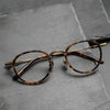 Henk Titanium Vintage Oval Eyeglasses Frame